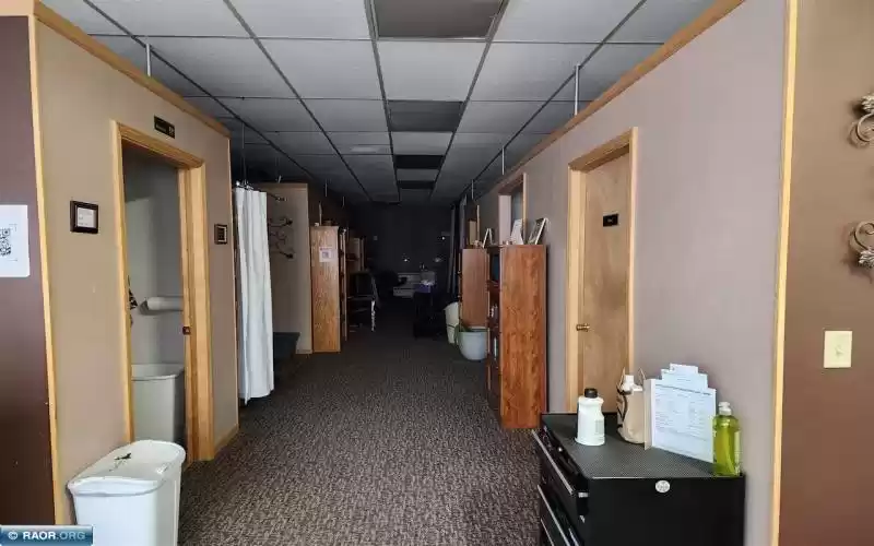 Hall of salon with dedicated rooms for services